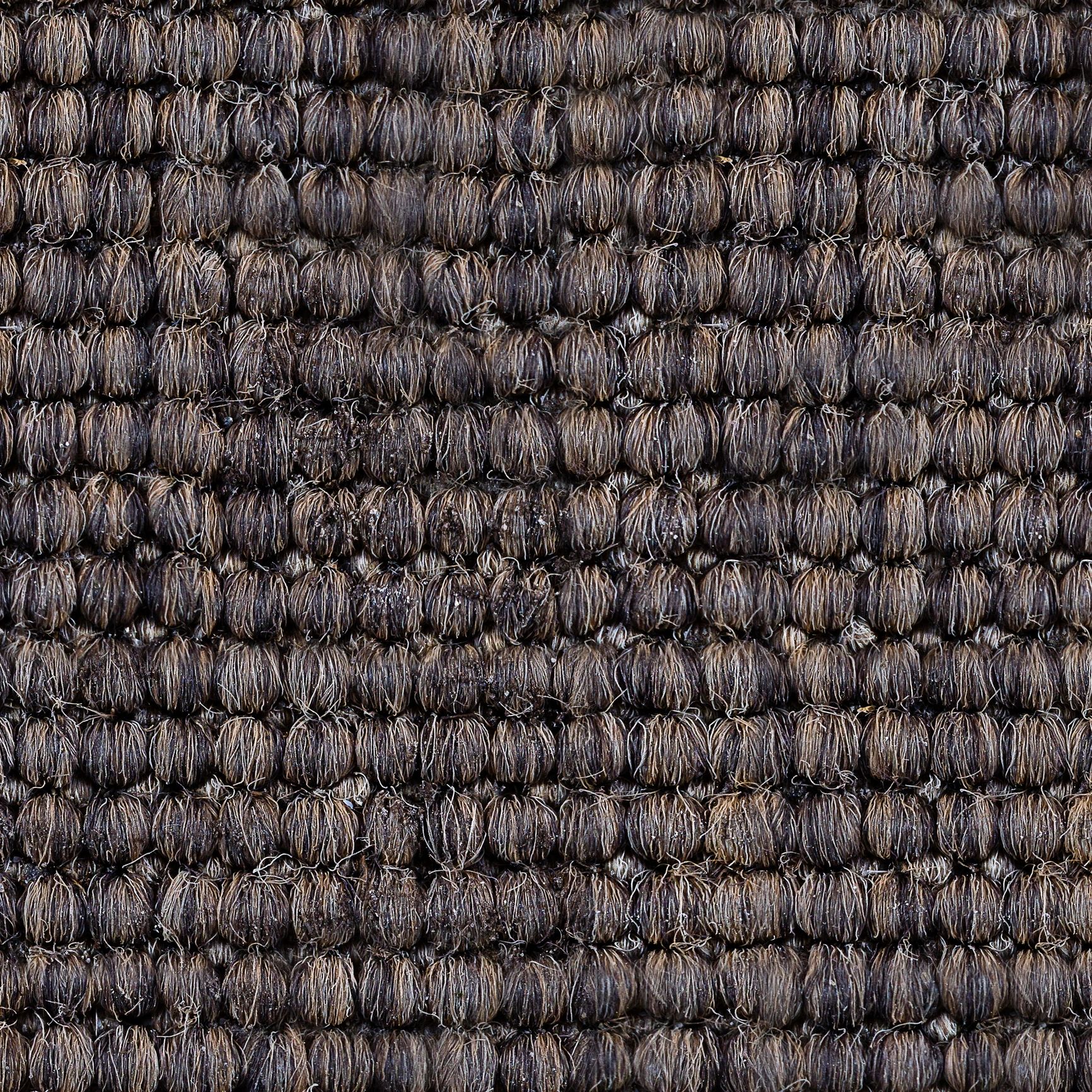 Warm brown woven rug texture